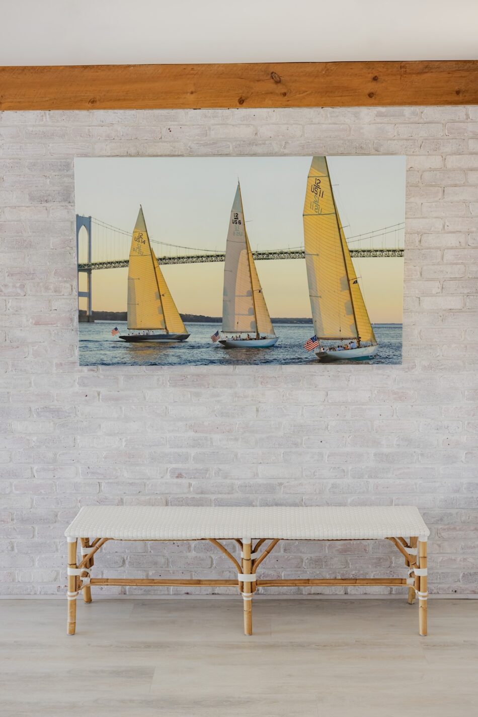 bench-whitewashed-brick-wall-sailboat-art-2