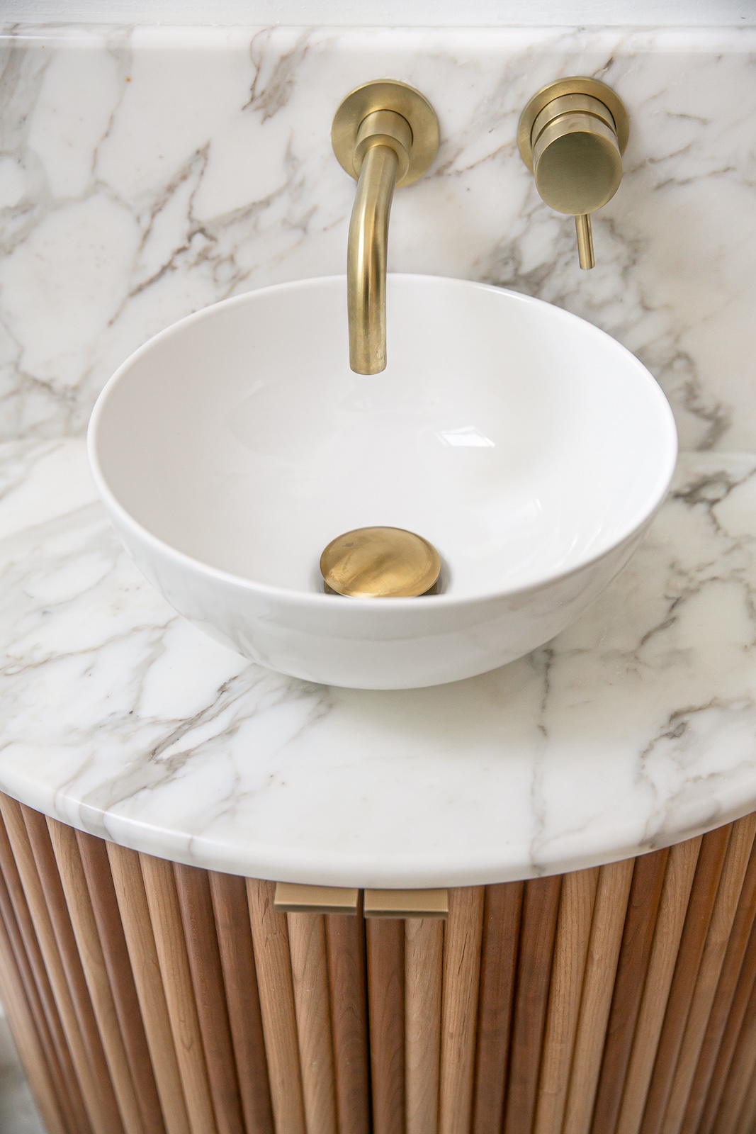 sink detail white gold wood bathroom design