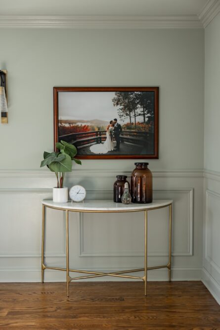 table-with-vases-and-framed-wedding-portrait
