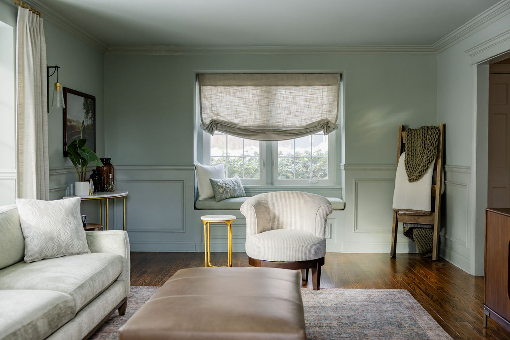a contemporary and inviting living room with layered textiles and a cozy atmosphere